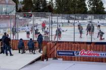 Vegas Golden Knights practice on an outdoor rink built over the 18th fairway of a golf course i ...