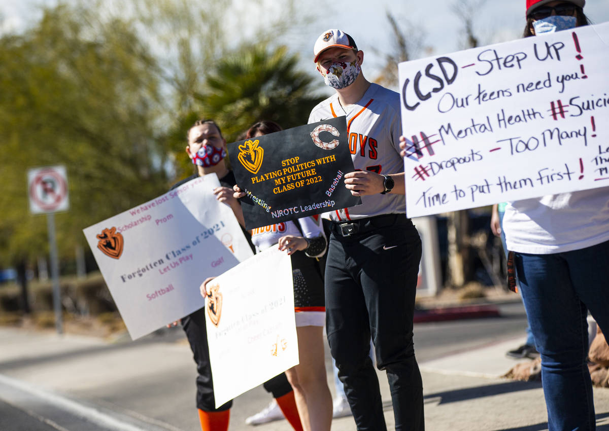 Chaparral High School baseball player Rodney Alger participates in a rally to urge school distr ...