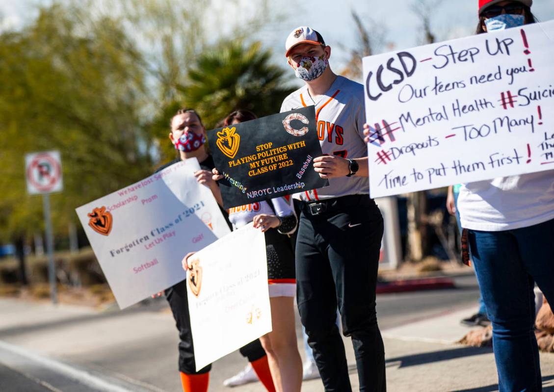 Chaparral High School baseball player Rodney Alger participates in a rally to urge school distr ...