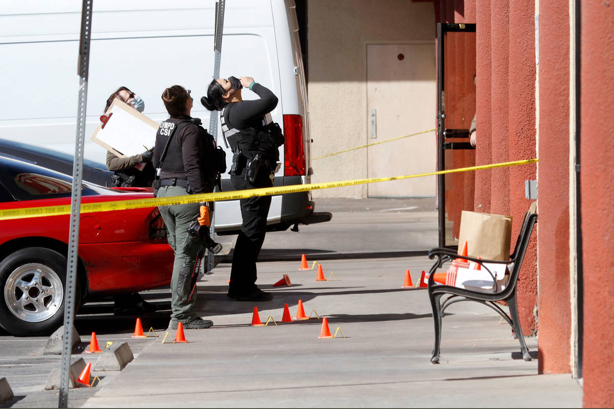 Las Vegas police investigate a homicide, Feb. 20, 2021, near the 6000 block of West Flamingo Ro ...