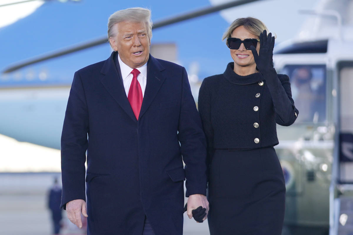 President Donald Trump and first lady Melania Trump arrive on Marine One before boarding Air Fo ...