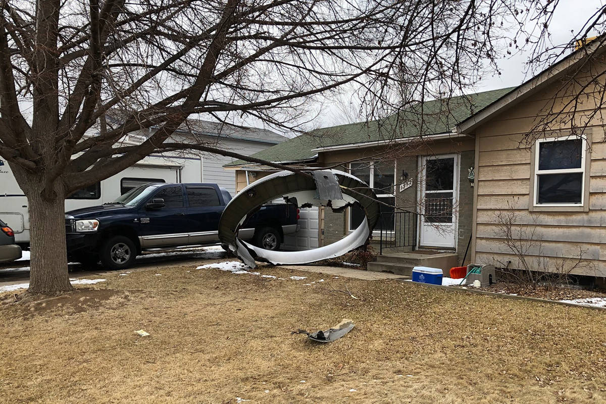 In this photo provided by the Broomfield Police Department on Twitter, debris is scattered in t ...