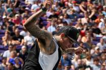 Nyjah Huston pulls off a trick in the men's skateboard street final at the X Games in Minneapol ...