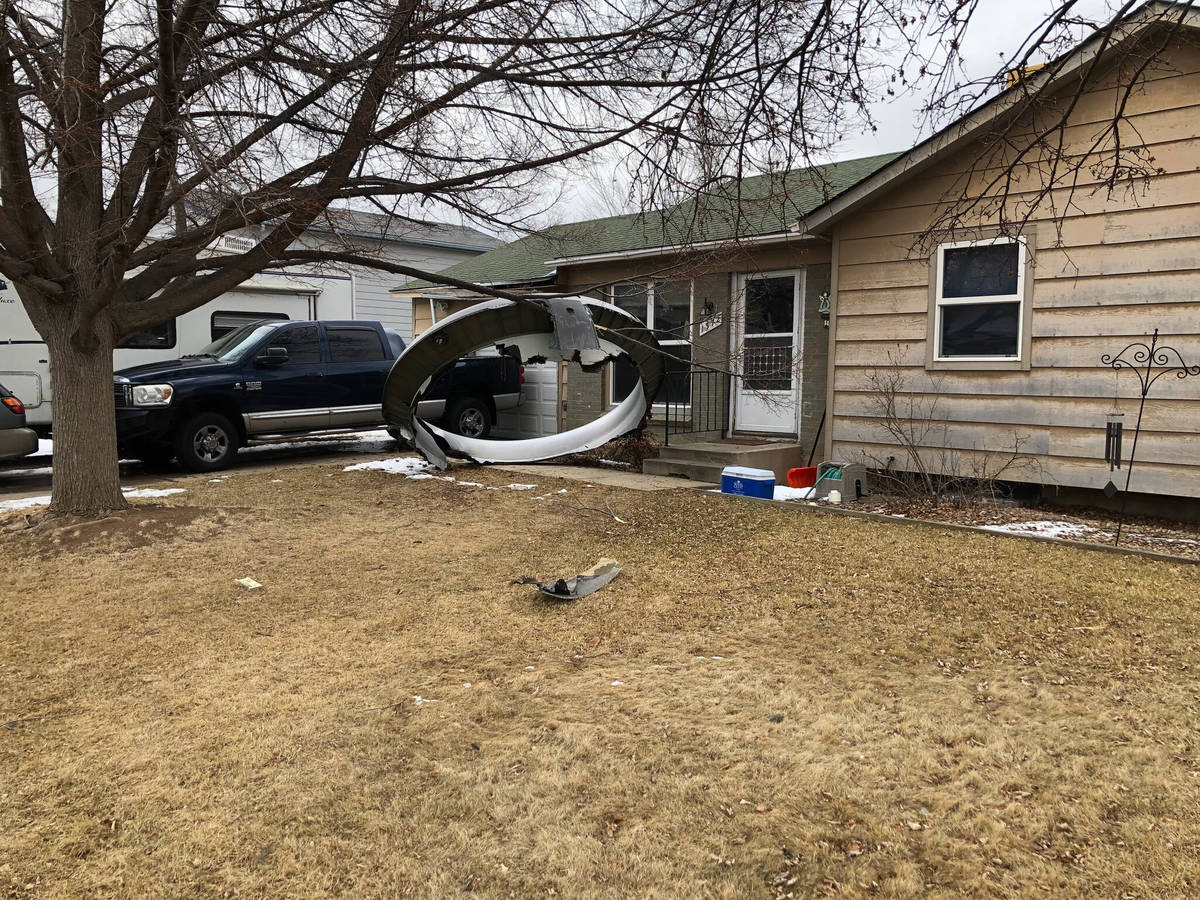 In this photo provided by the Broomfield Police Department on Twitter, debris is scattered in t ...