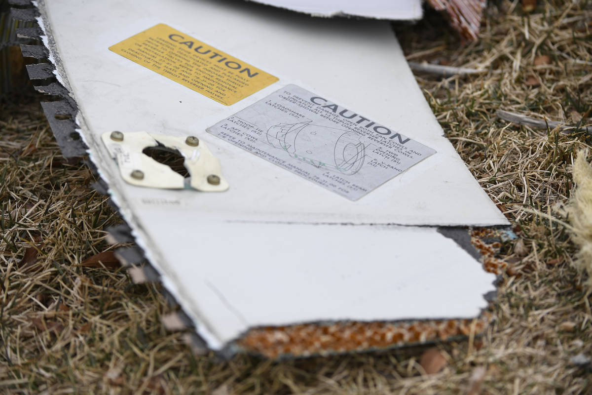 A piece of an airplane engine is seen in the median along Sheridan Boulevard near E. 13th Avenu ...