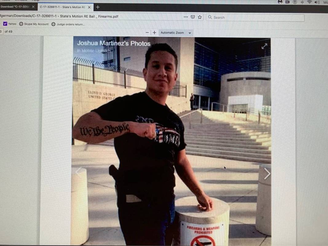 Joshua Martinez standing outside the Lloyd D. George U.S. Courthouse. The photo appears as exhi ...