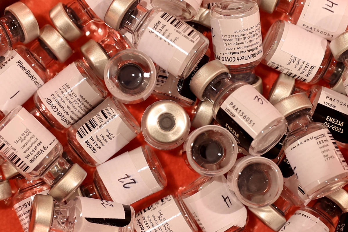 Pfizer vaccine vials at the Cashman Center COVID-19 vaccination site in Las Vegas Thursday, Feb ...