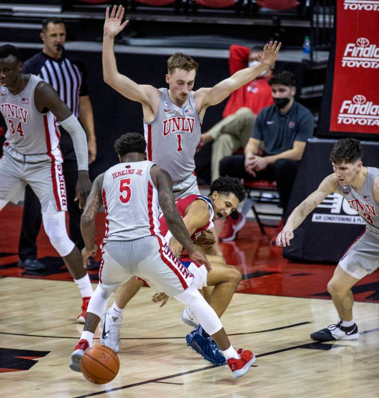 Fresno State Bulldogs guard Isaiah Hill (3) yells as he loses the ball between the legs of UNLV ...