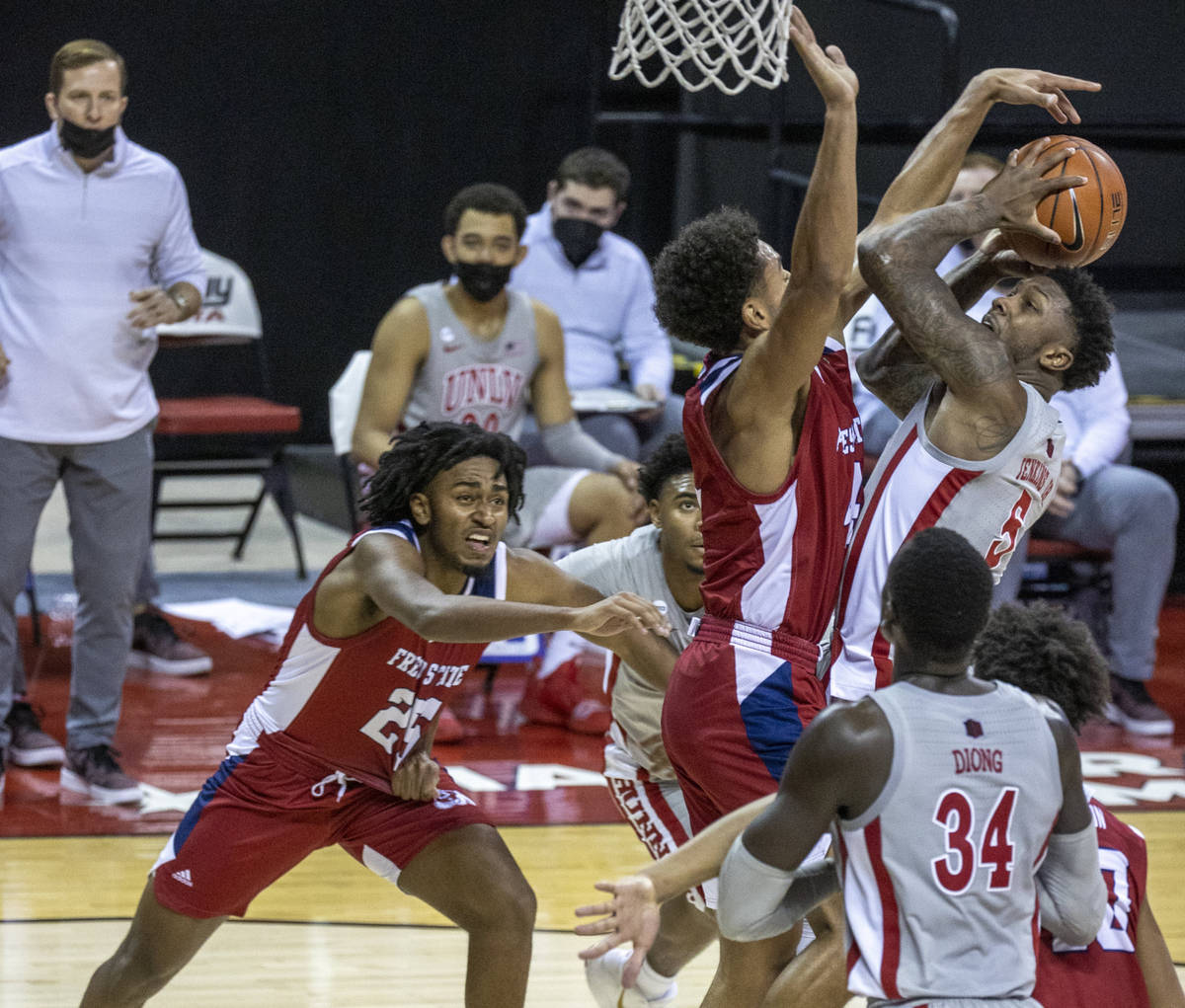 UNLV Rebels guard David Jenkins Jr. (5) goes up strong for a shot against Fresno State Bulldogs ...