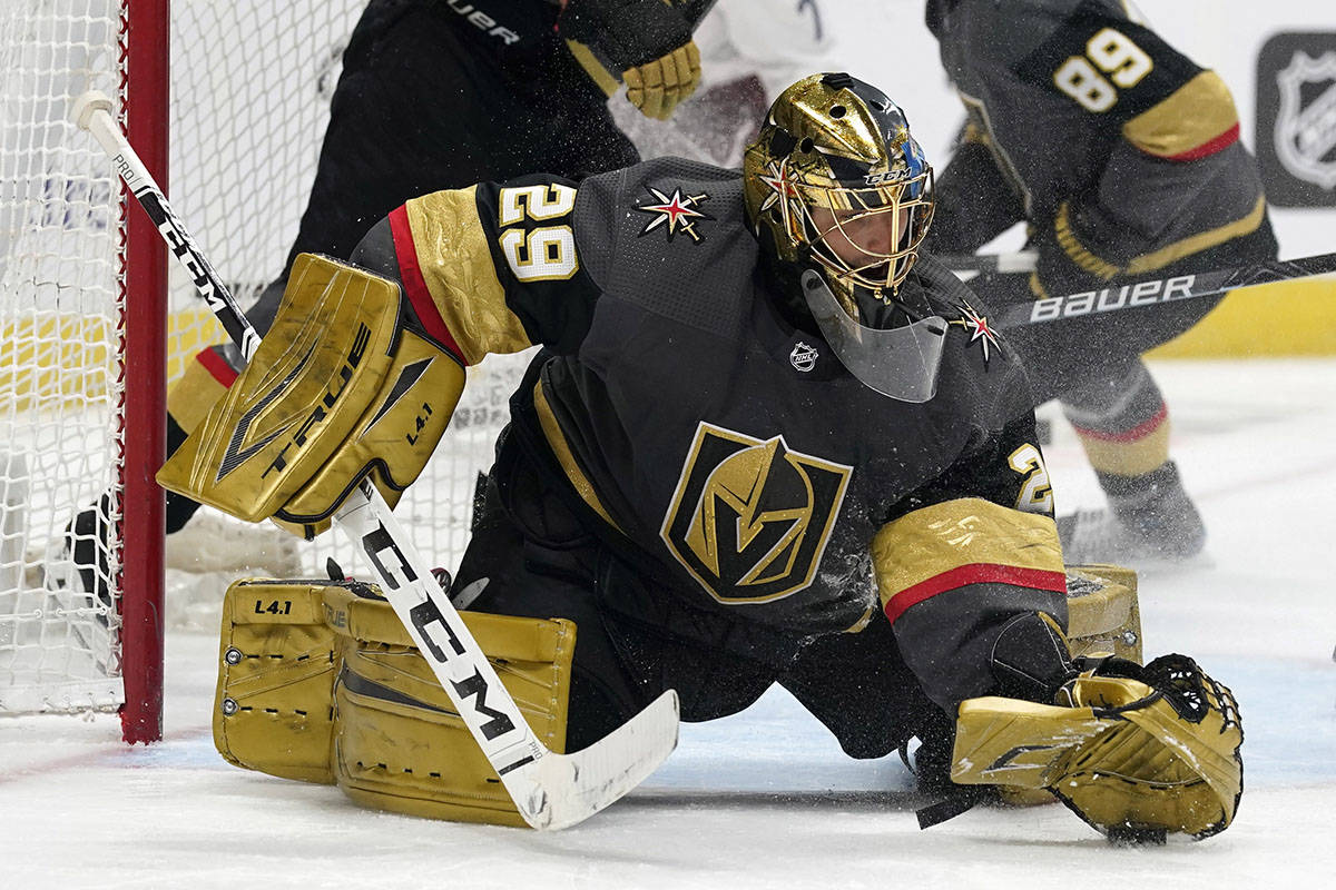 Vegas Golden Knights goaltender Marc-Andre Fleury makes a glove save of a shot against the Colo ...