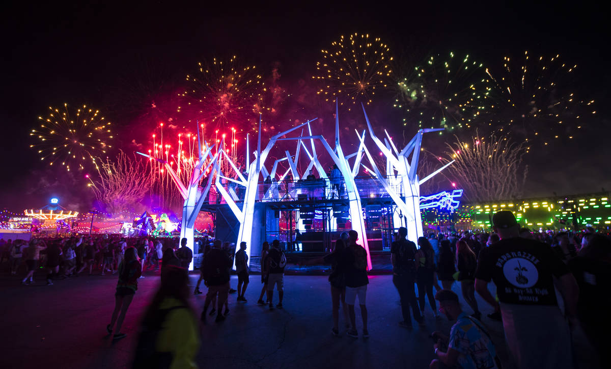 Fireworks go off above the Forest House art car during the first day of the Electric Daisy Carn ...