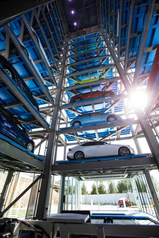 An interior view at Carvana, a fully-automated, coin-operated car vending machine, in Las Vegas ...