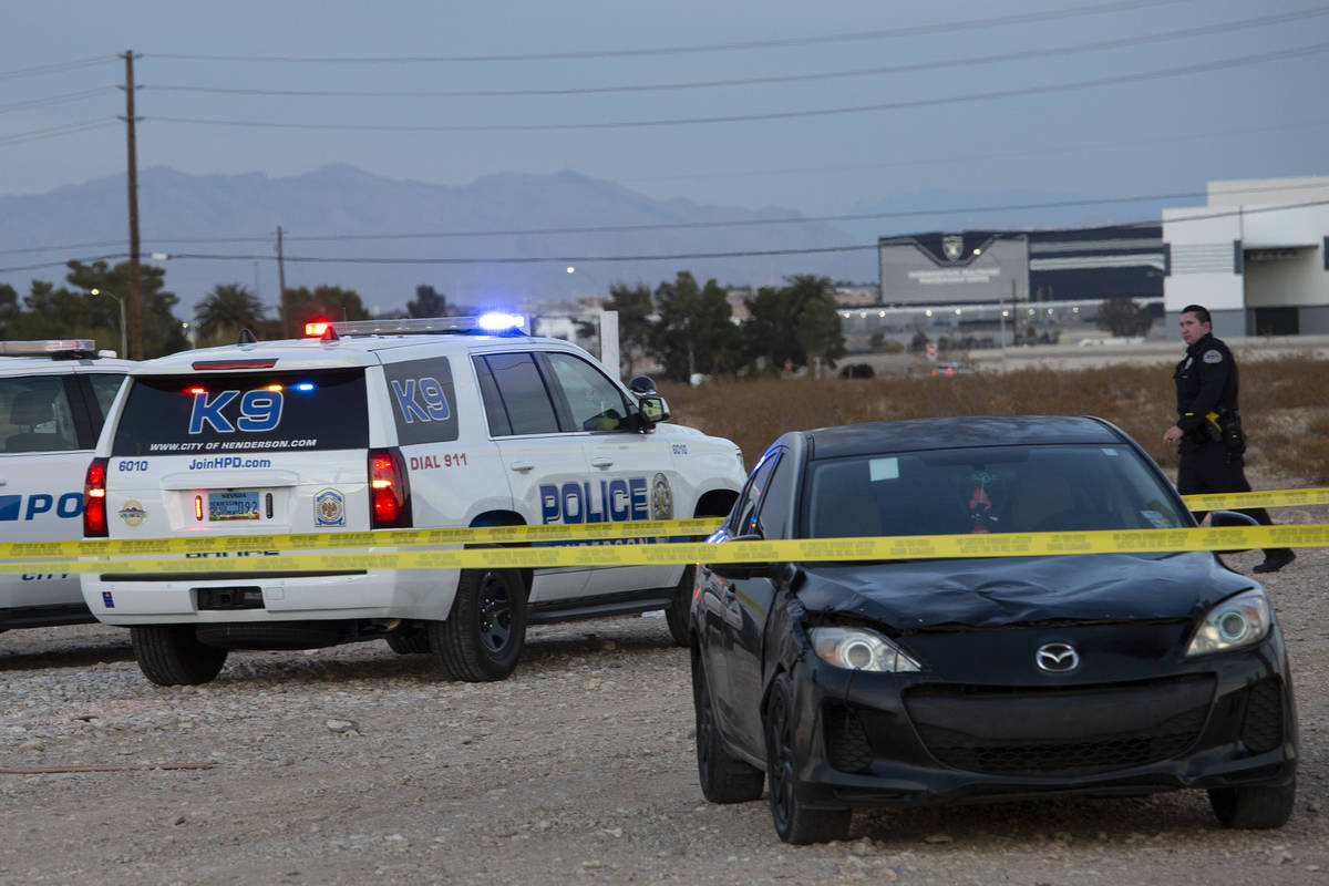 Henderson police investigate the scene of a fatal attempted car jacking on Tuesday, Feb. 23, 20 ...