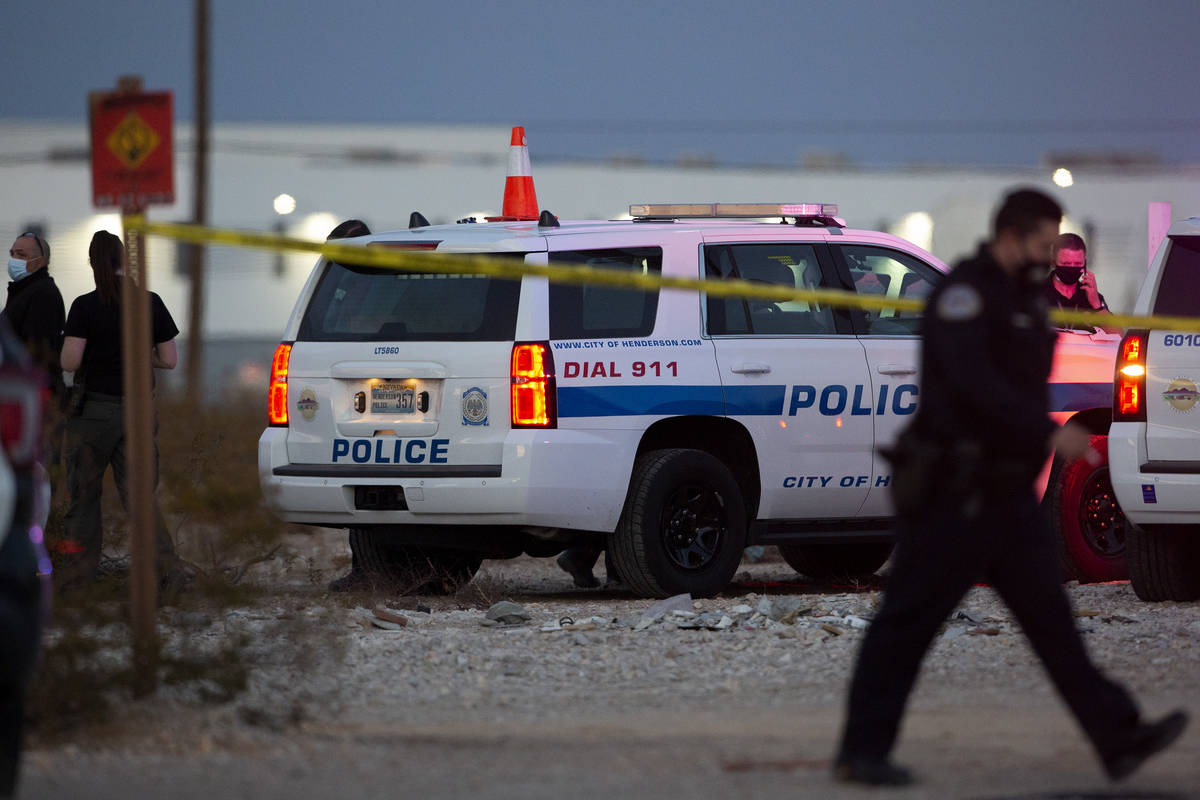 Henderson police investigate the scene of a fatal attempted car jacking on Tuesday, Feb. 23, 20 ...