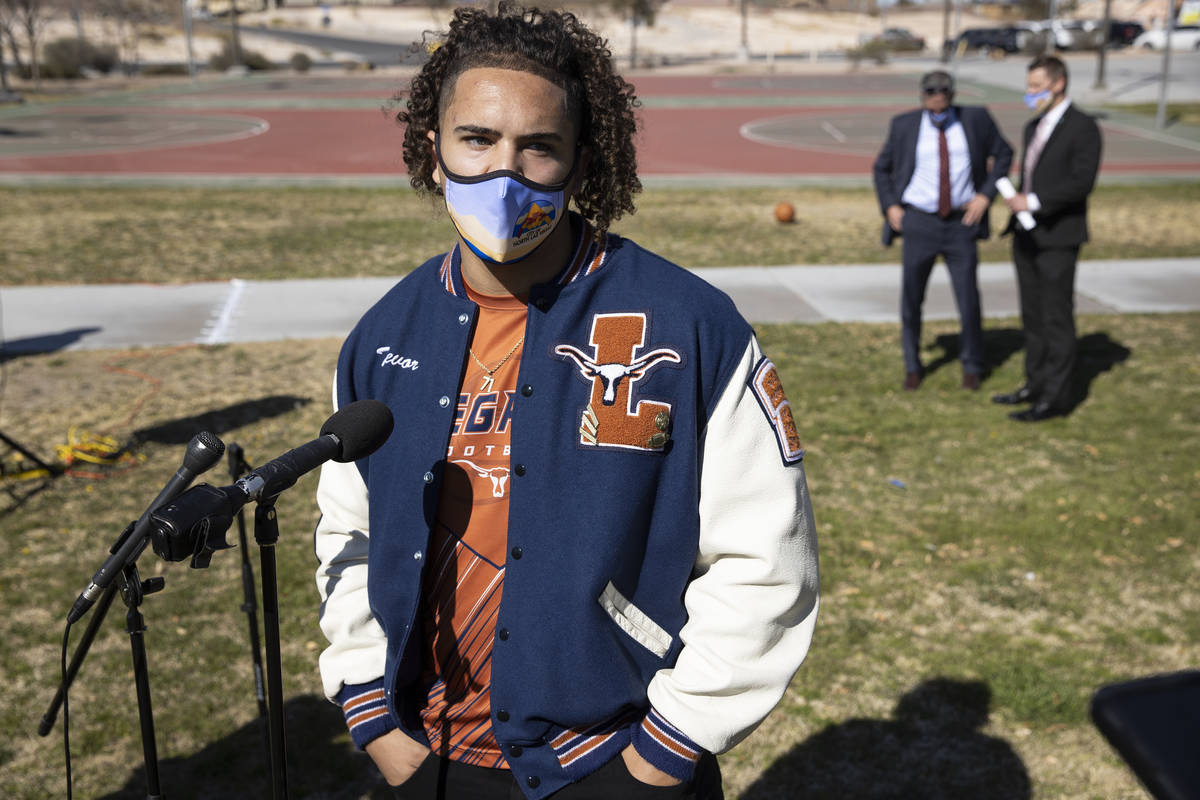 Football player Trevor Moser, 17, a senior a Legacy High School, is interviewed during a press ...