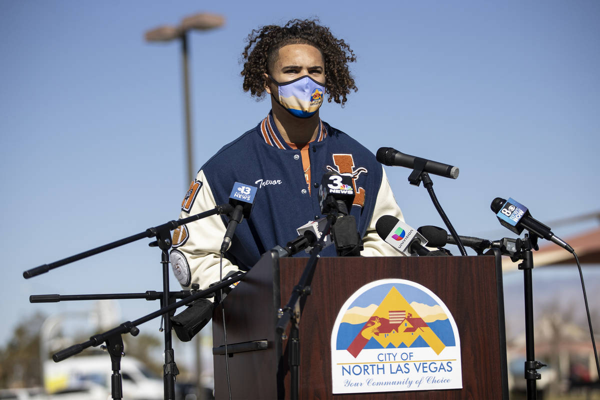 Football player Trevor Moser, 17, a senior a Legacy High School, is interviewed during a press ...