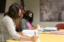Maria Aguirre, left, Election and Administration Service supervisor, and Sabrina Mercadante, th ...