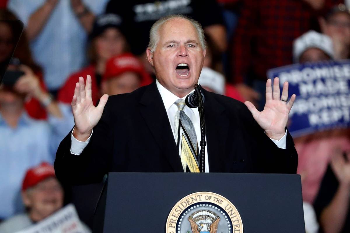 Rush Limbaugh introduces President Donald Trump at the start of a campaign rally in Cape Girard ...