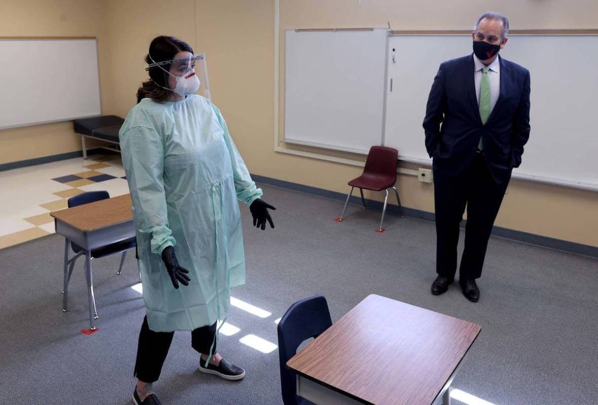 Clark County School District registered nurse Nicole Baerg and Superintendent Jesus Jara show ...