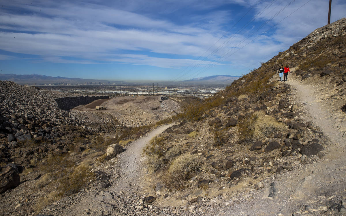 Miriam Hejji, right, and friend Nictoria Pleasant-Rede hike along the Amargosa Trail in Henders ...