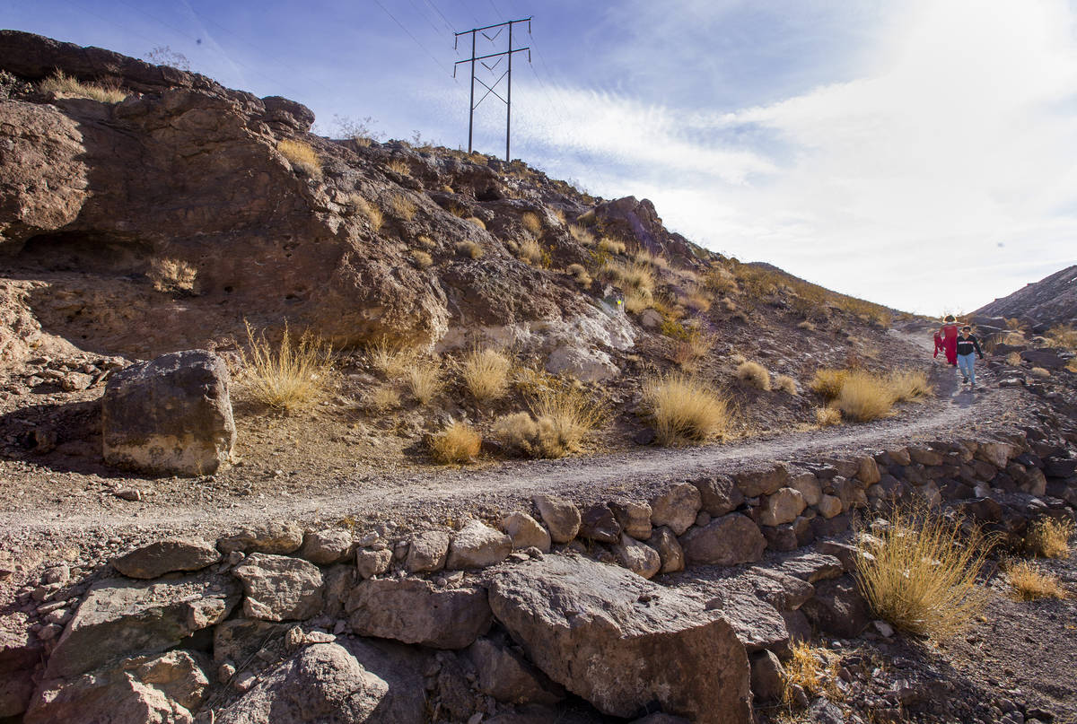 Miriam Hejji, right, and friend Nictoria Pleasant-Rede hike along the Amargosa Trail on Wednesd ...