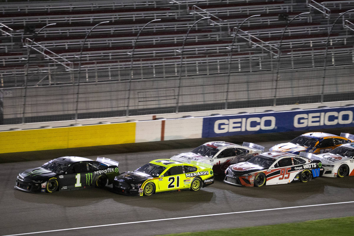 Drivers trail behind race winner Kurt Busch (1) during a NASCAR Cup Series auto race ...