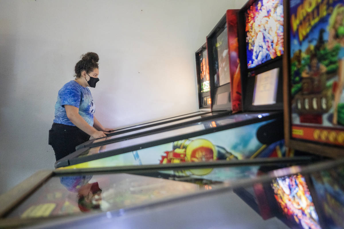 Sayler Eastin, 17, of Columbia, Mo., plays games at the Pinball Hall of Fame in 2020 in Las Veg ...