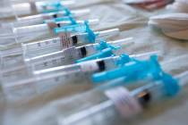 Doses of the Moderna COVID-19 vaccine are ready to be used at Guardian Elite Medical Services' ...