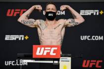 Kevin Croom poses on the scale during the UFC weigh-in at UFC APEX on February 26, 2021 in Las ...