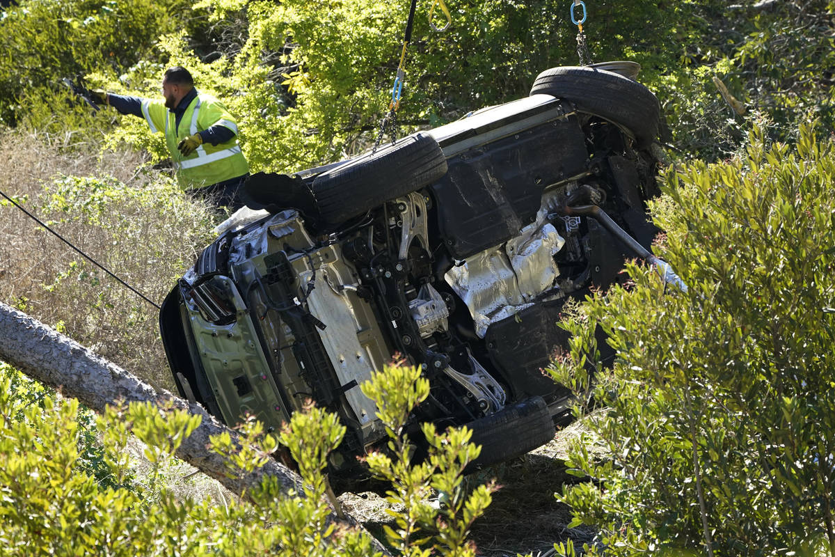 Firefighters relied on ax, luck to free Tiger Woods in
