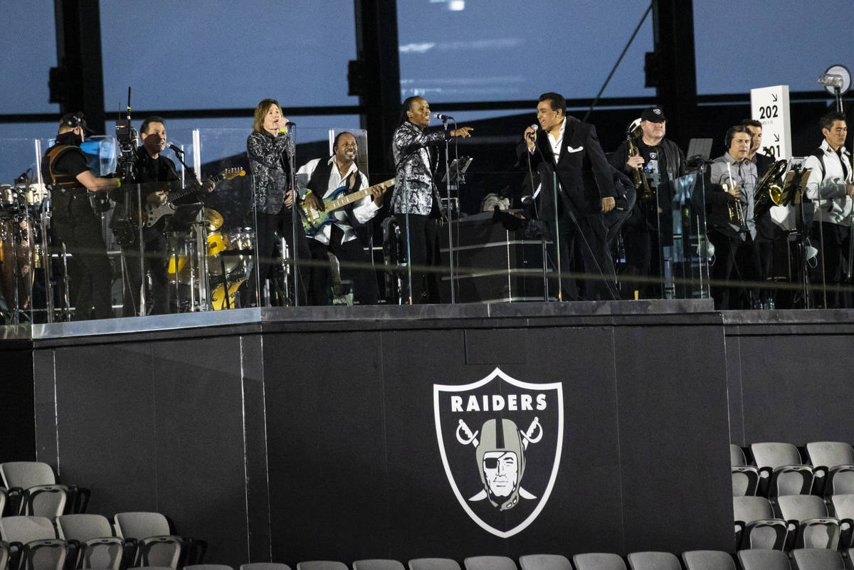 Members of Santa Fe & The Fat City Horns perform at Allegiant Stadium in Las Vegas on Sunda ...