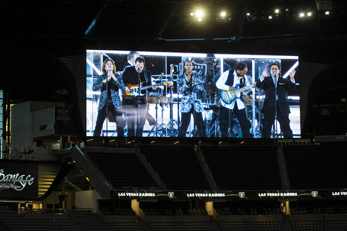Members of Santa Fe & The Fat City Horns perform at Allegiant Stadium in Las Vegas on Sunda ...