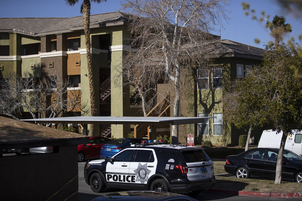 Las Vegas police investigate an apparent murder-suicide inside an apartment at the Falling Wate ...