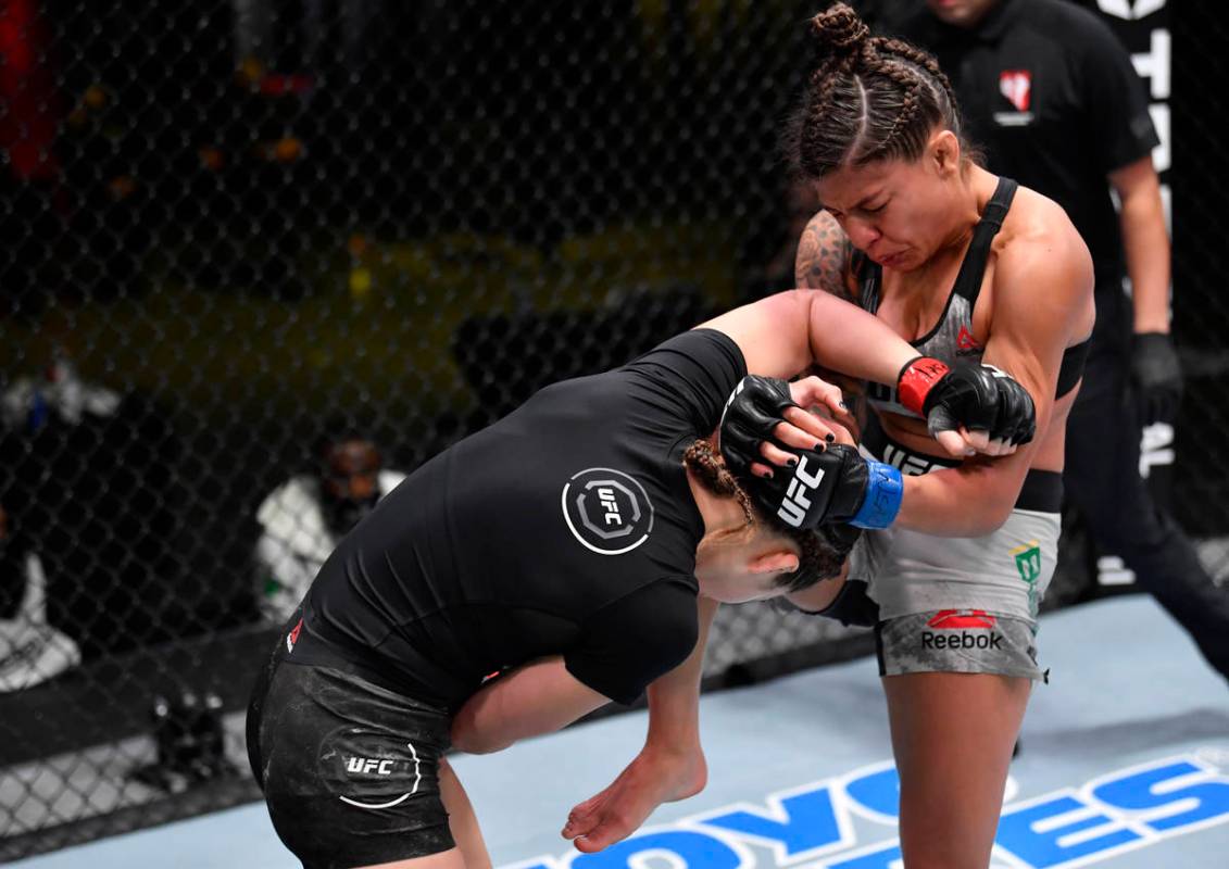 LAS VEGAS, NEVADA - FEBRUARY 27: (R-L) Mayra Bueno Silva of Brazil knees Montana De La Rosa in ...