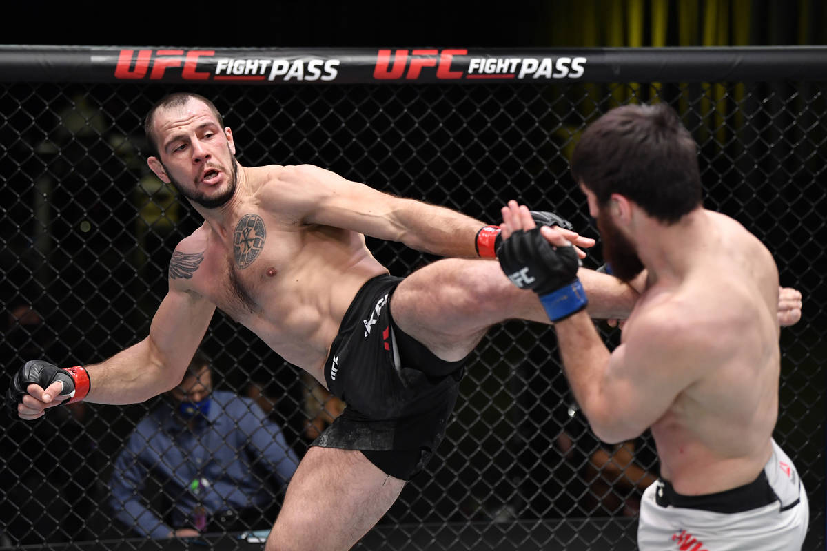 LAS VEGAS, NEVADA - FEBRUARY 27: (L-R) Nikita Krylov of the Ukraine kicks Magomed Ankalaev of R ...