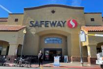 An unidentified shopper leaves a Safeway supermarket in central Phoenix on February 23, 2021. ( ...