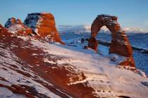 Snow covers delicate Arch at Arches National Park near Moab, Utah, in 2010. (AP Photo/Julie Jac ...