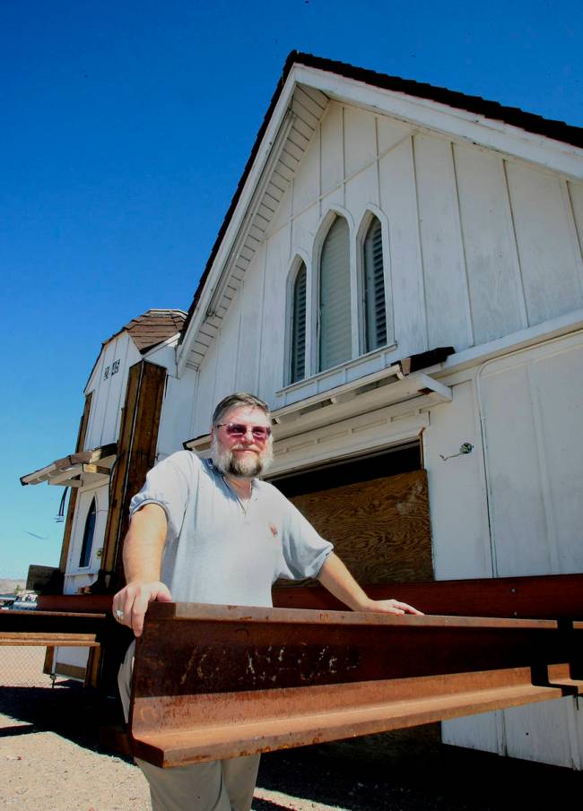 Clark County Museum administrator Mark Hall-Patton stands next to the old Candlelight Wedding C ...