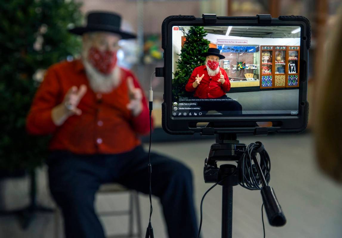 Mark Hall-Patton conducts a Facebook Live session within the former Boulder City Depot building ...