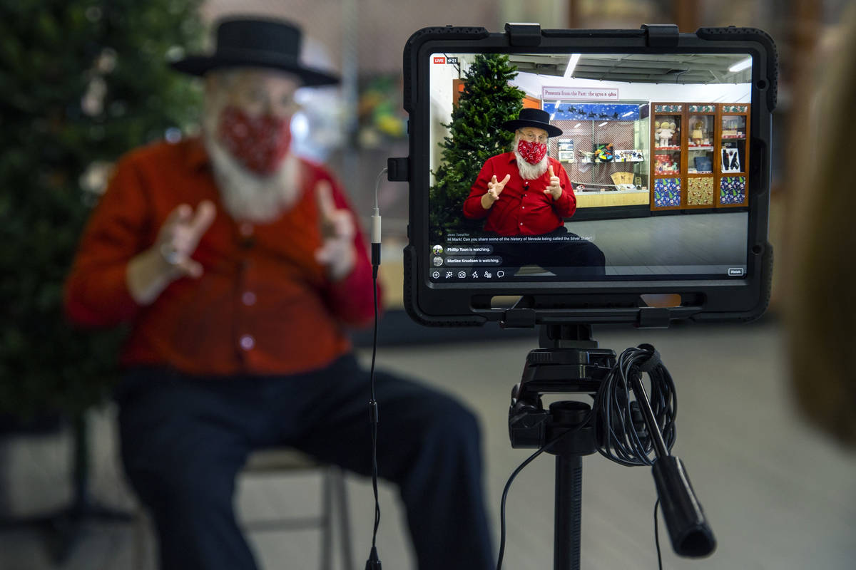 Mark Hall-Patton conducts a Facebook Live session within the former Boulder City Depot building ...