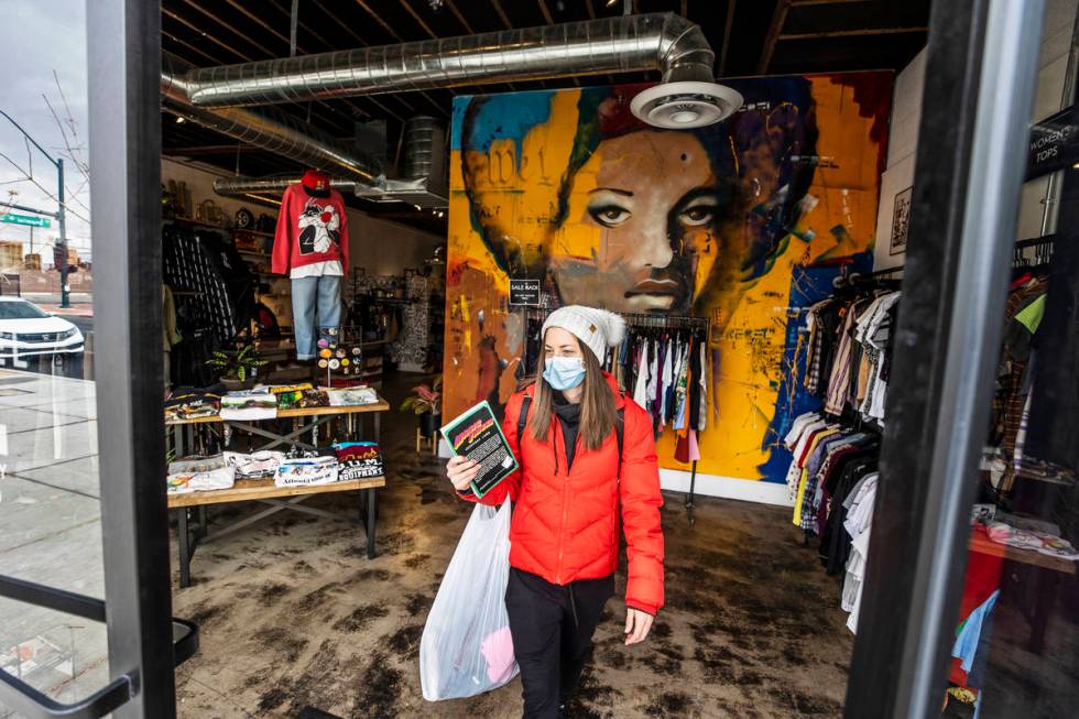 Customer Sean Wilson leaves Arts District thrift store Alt Rebel after making some purchases. ( ...