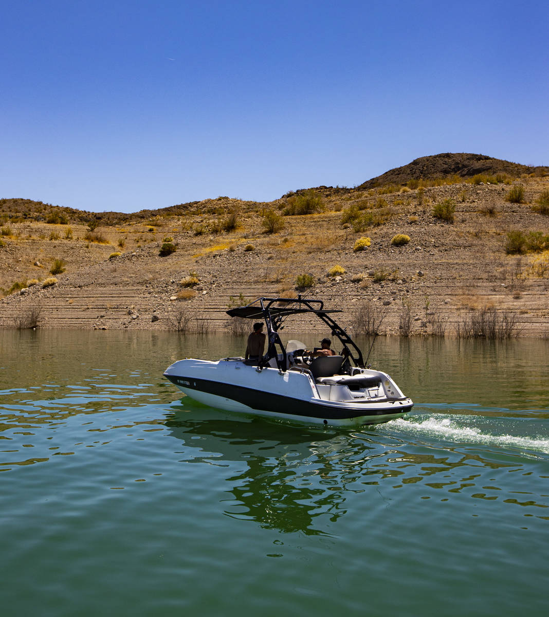 A boat passes by at the Callville Bay Marina at Lake Mead National Recreation Area on Wednesday ...