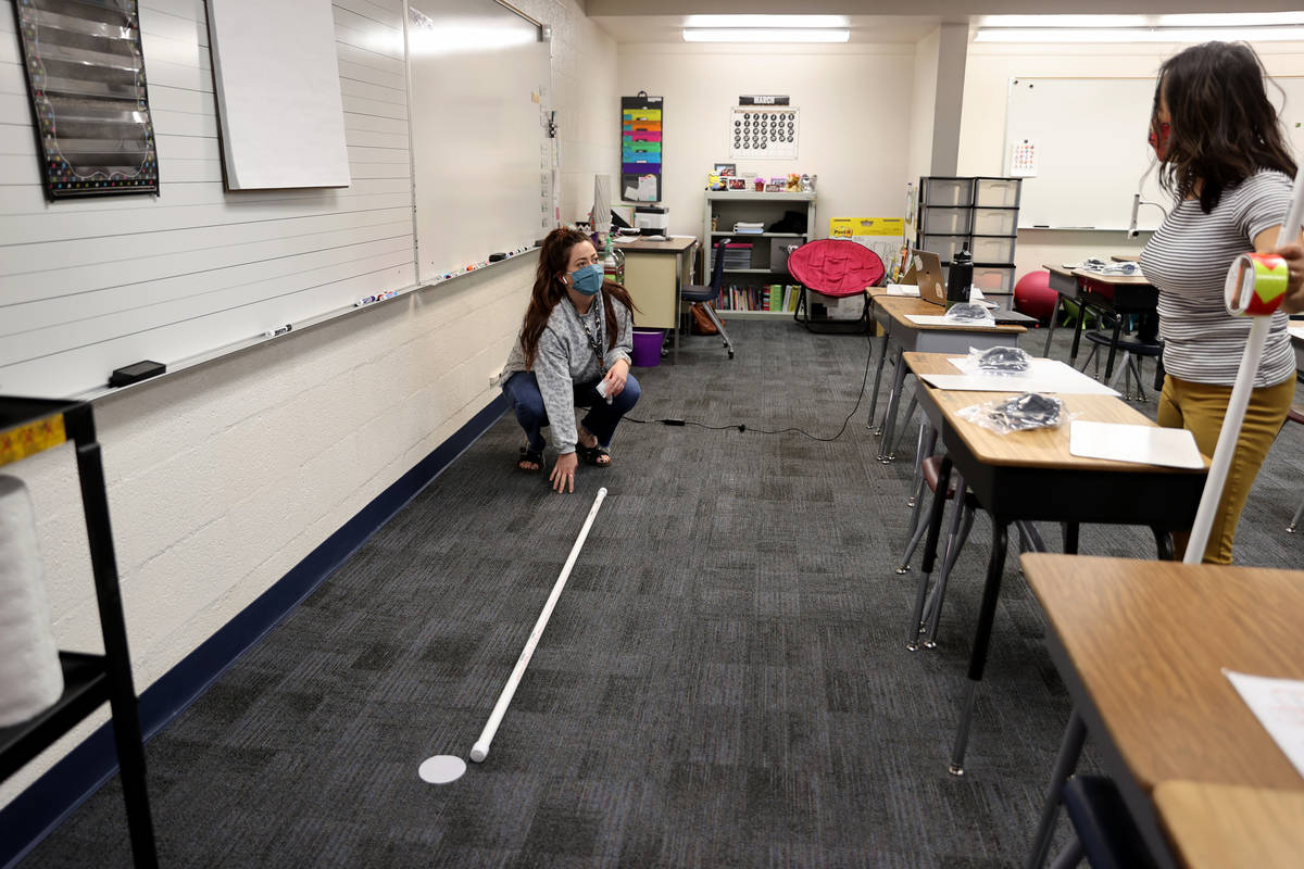 Golda Gilliam, right, assistant principal at Dearing Elementary School in Las Vegas, right, and ...