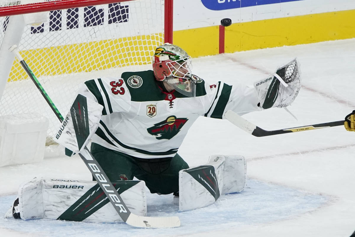 Minnesota Wild goaltender Cam Talbot (33) looks at an attempted shot by the Vegas Golden Knight ...