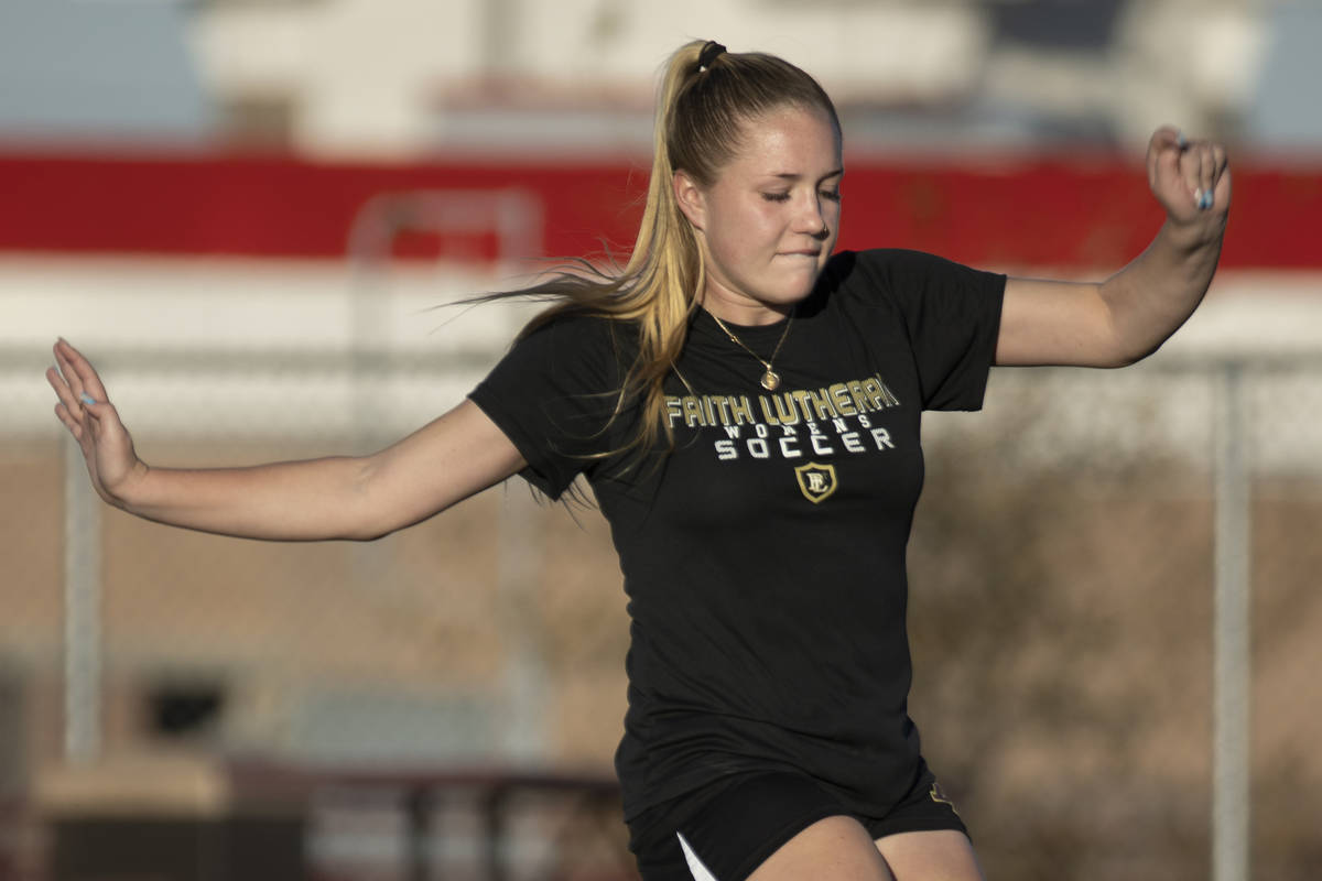 Player Kennedy Lazeby takes a shot on goal during girlÕs soccer team practice at Faith Lut ...