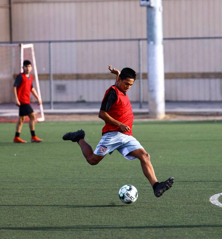 Equipo Academy's Orlando Zurita kicks the ball during soccer practice at Mike Morgan Park in La ...