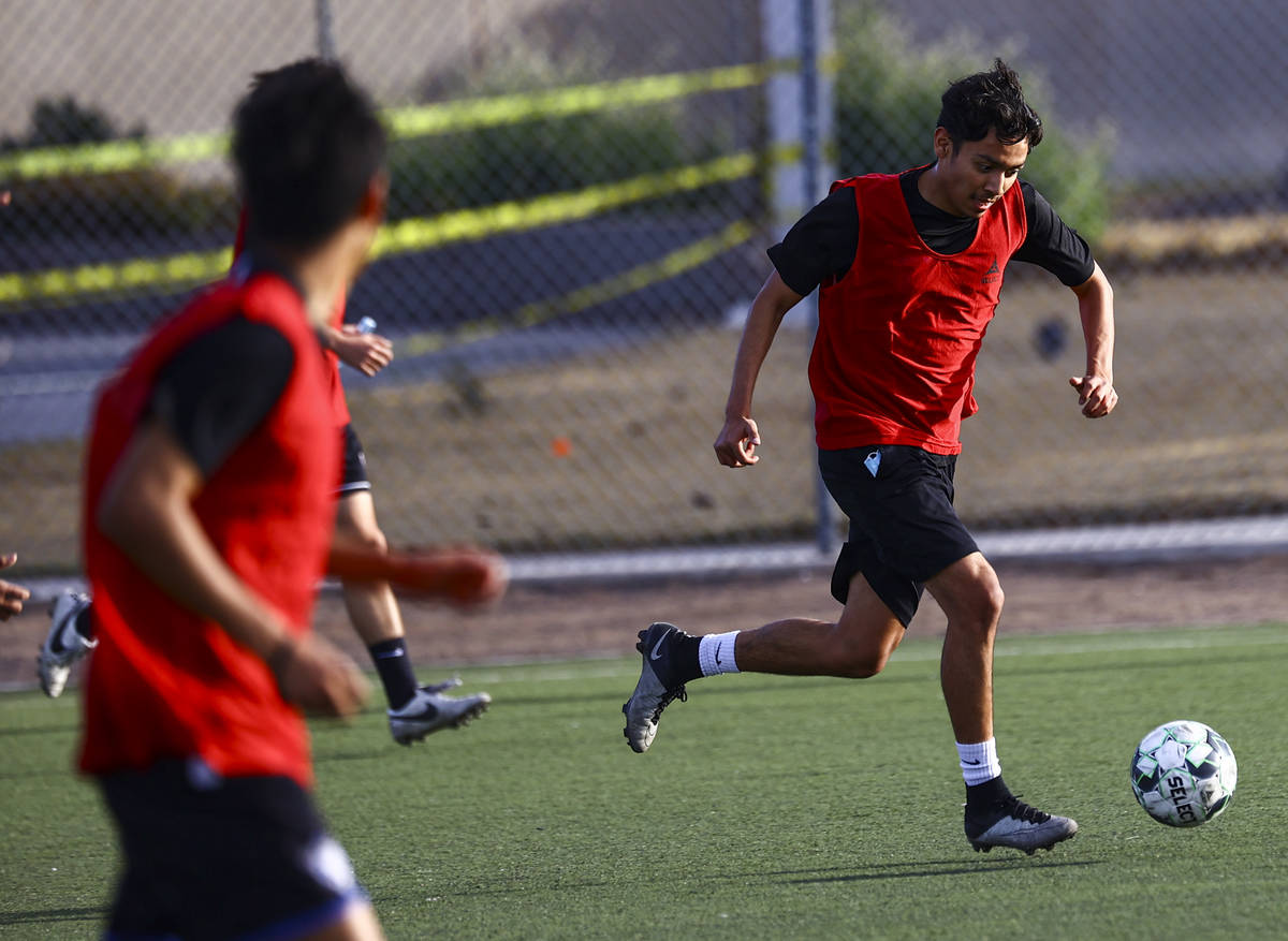 Equipo Academy's Jonathan Rodriguez controls the ball during soccer practice at Mike Morgan Par ...