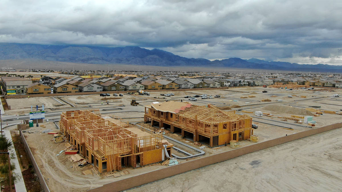 An aerial view of housing developments near North Decatur Boulevard between Elkhorn Road and Gr ...