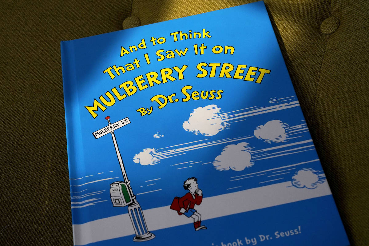 A copy of the book "And to Think That I Saw It on Mulberry Street," by Dr. Seuss, res ...