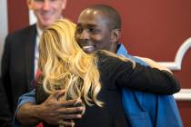 In this June 30, 2017, file photo, DeMarlo Berry hugs his attorney Samantha Wilcox following a ...